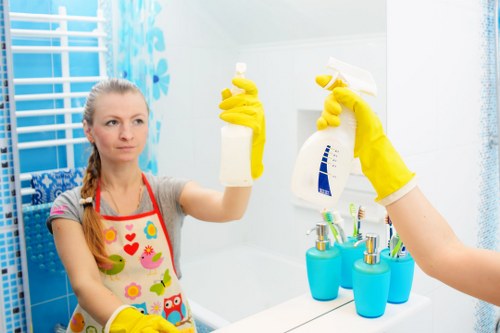 Carpet cleaning technician working safely in a home