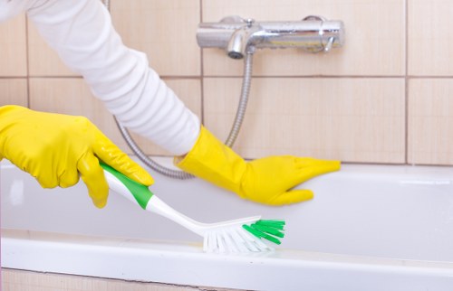 Local SW15 cleaner vacuuming a modern London home