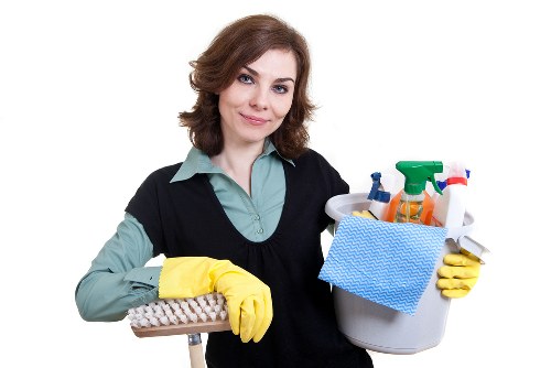 House cleaning tasks in SW15 including dusting and vacuuming
